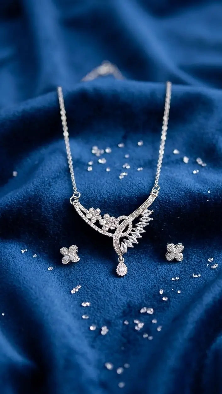 lumina-leaf-asymmetric-zircon-necklace-earrings-silver-mishi-collections